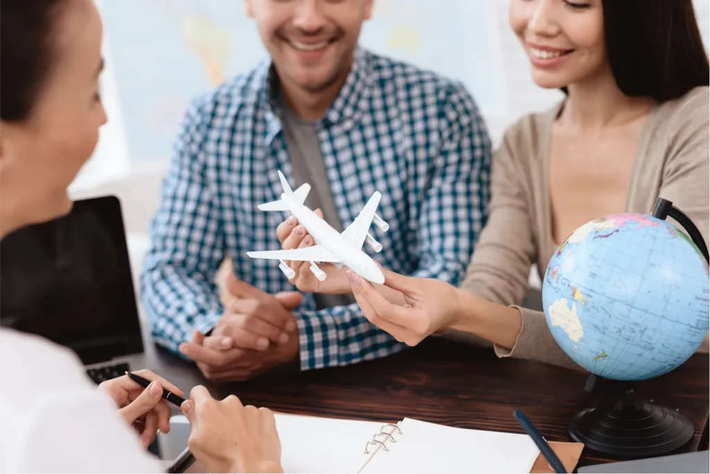 couple-holding-toyplane