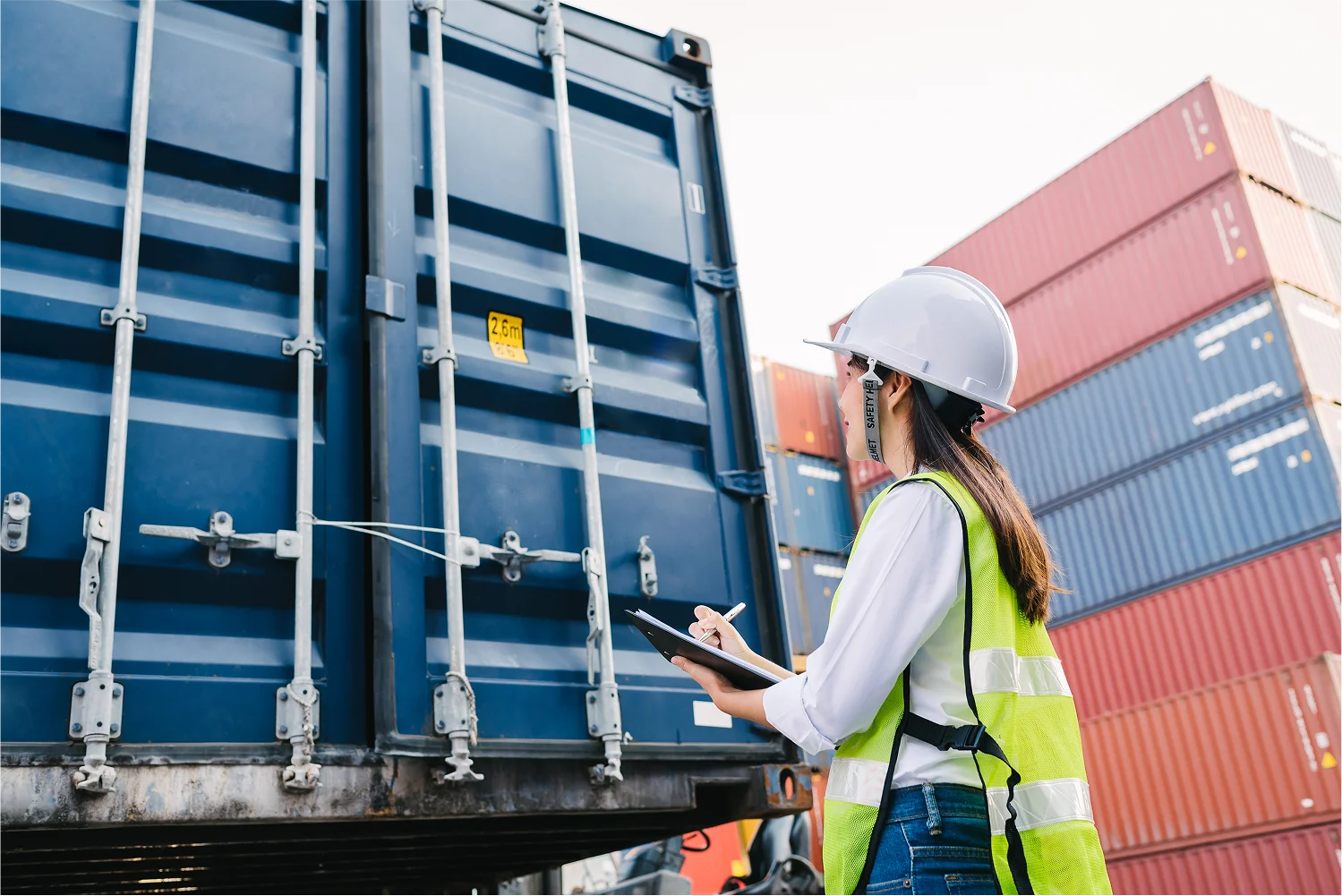 lady-checking-containers