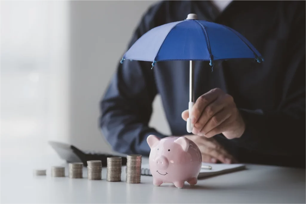piggy-bank-protecting-with-umbrella