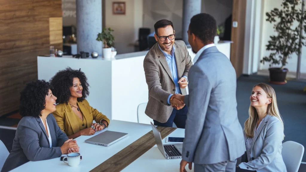 staff-discussing-panel-of-five-people
