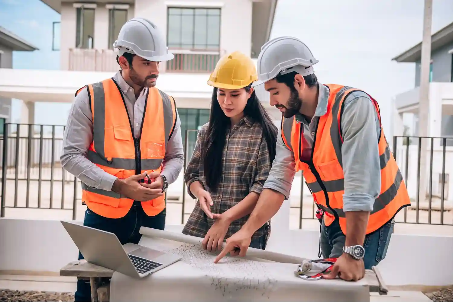 two-engineers-discussing-with-lady-engineer