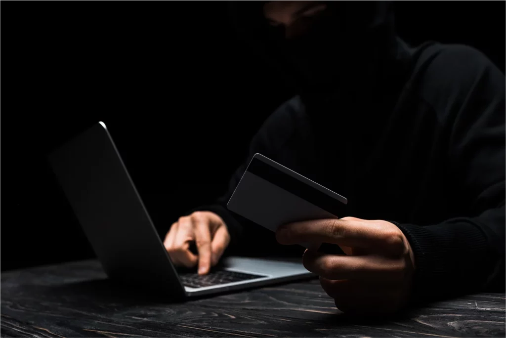 thief-checking-in-laptop