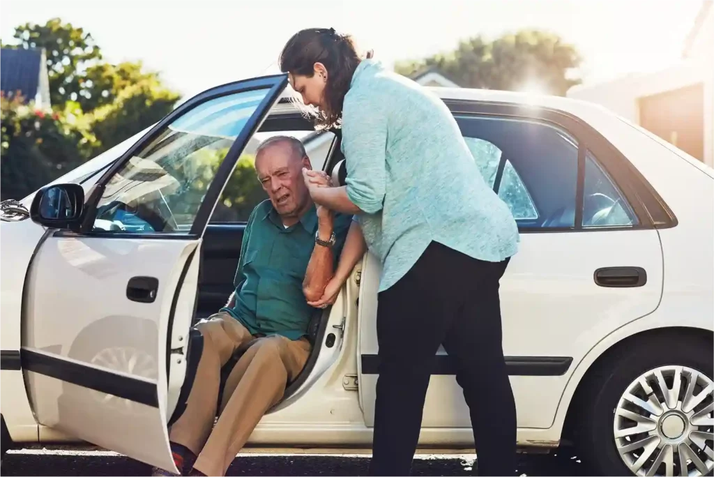 women-helping-old-man